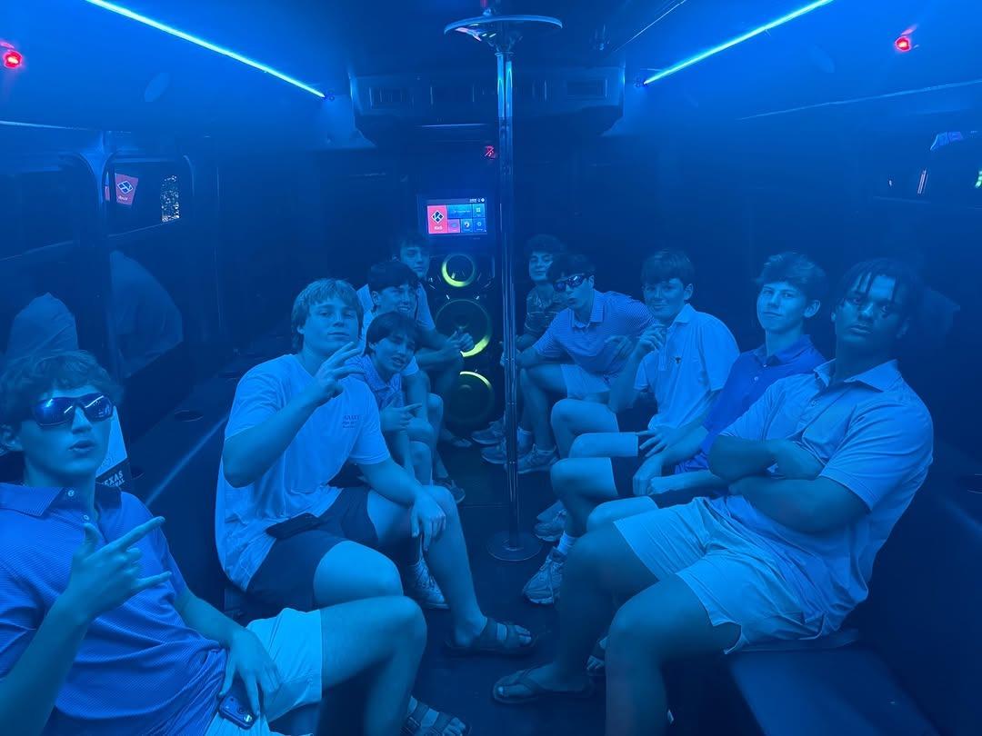 Friends celebrating birthday night out in AUX party bus