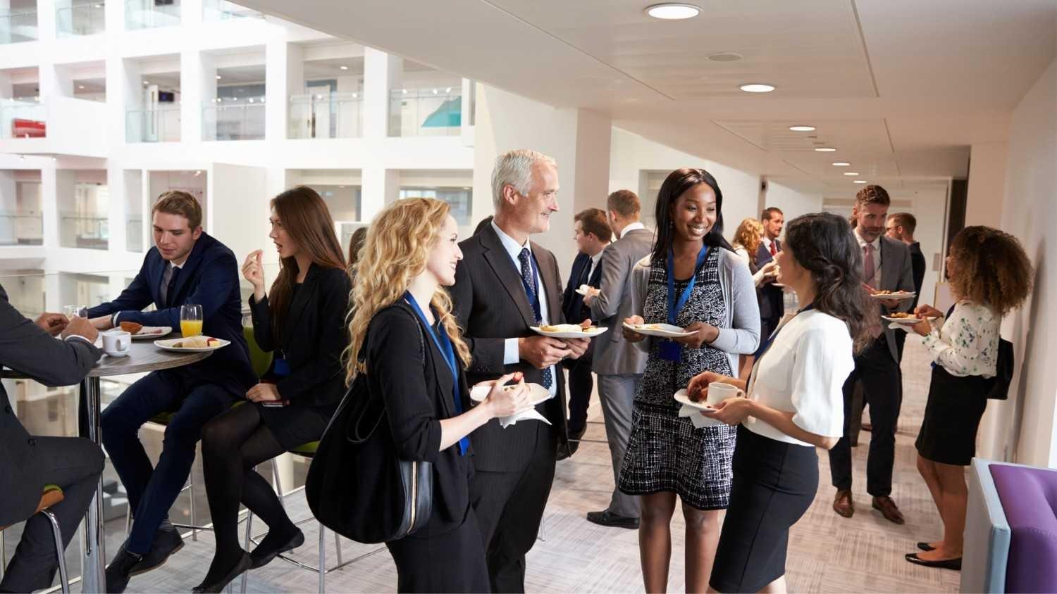 Business professionals networking at corporate conference and convention