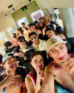 Group enjoying party bus